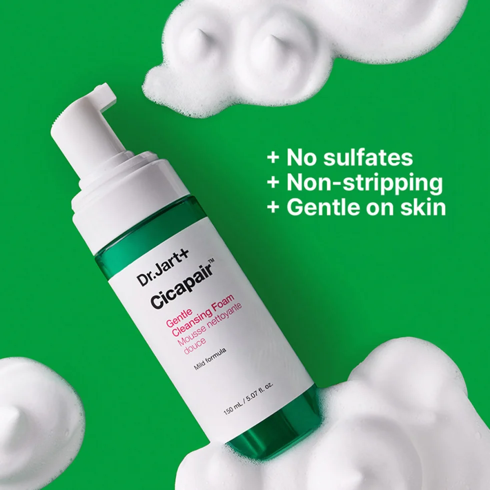 Dr. Jart+ Cicapair gentle cleansing foam bottle with foam texture on green background. Highlights no sulfates, non-stripping, gentle on skin.